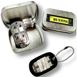 Grim Workshop - Spring Snare Trap Dog Tag: Trap Necklace  on keys white background in tin