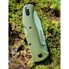 ROGAN Rogue folding knife special edition OD Green and Stonewash closed on mossy log